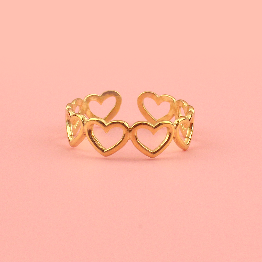 Gold plated stainless steel ring made up of gold cut out hearts