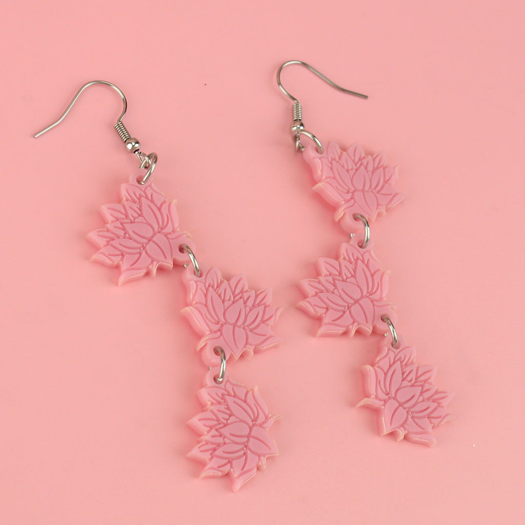 Pink acrylic cascading lotus flower charms on stainless steel earwires