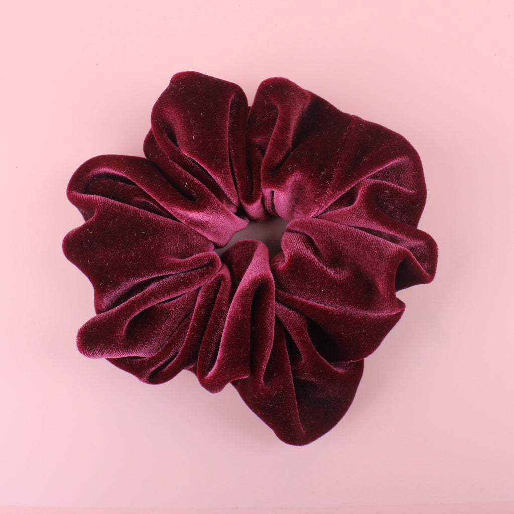 Maroon coloured velvet scrunchie