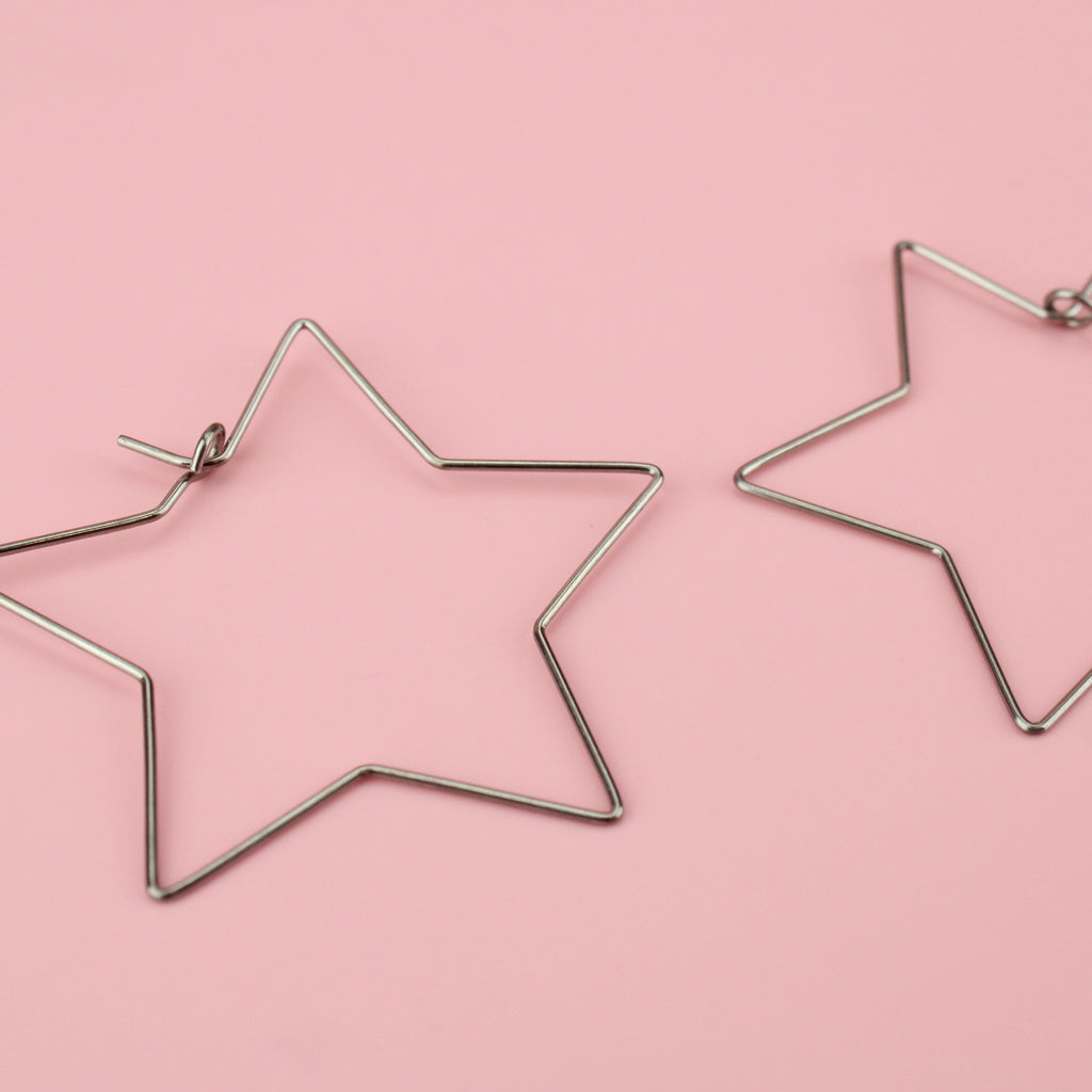 Cut out star shaped hoop earrings