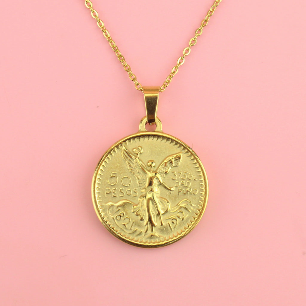 Pesos style pendant on a gold plated stainless steel chain