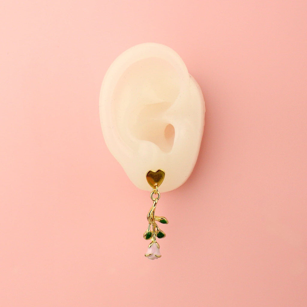 Ear wearing  Pink Enchanted Rose Earrings