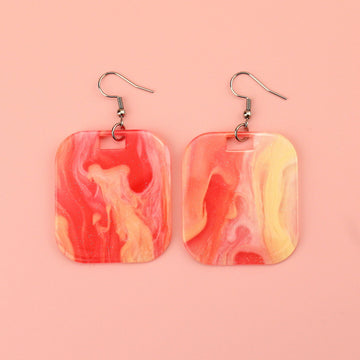Red sparkling glittery marble resin charms on stainless steel earwires