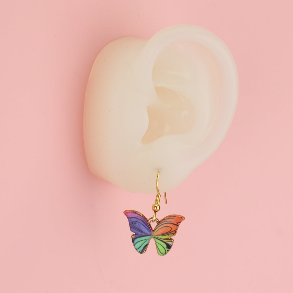Ear wearing Rainbow Butterfly Earrings