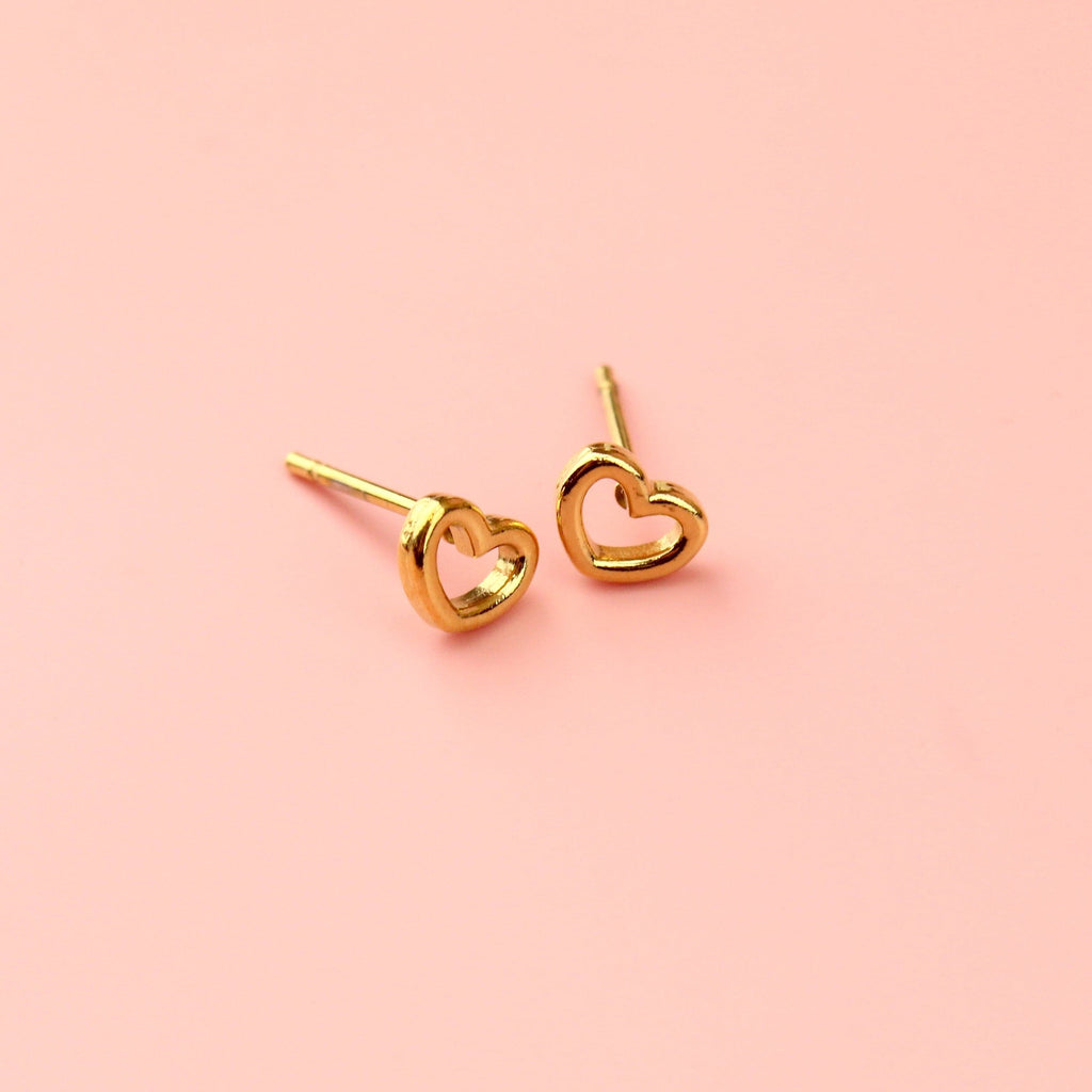 Small gold plated stainless steel cut out heart studs