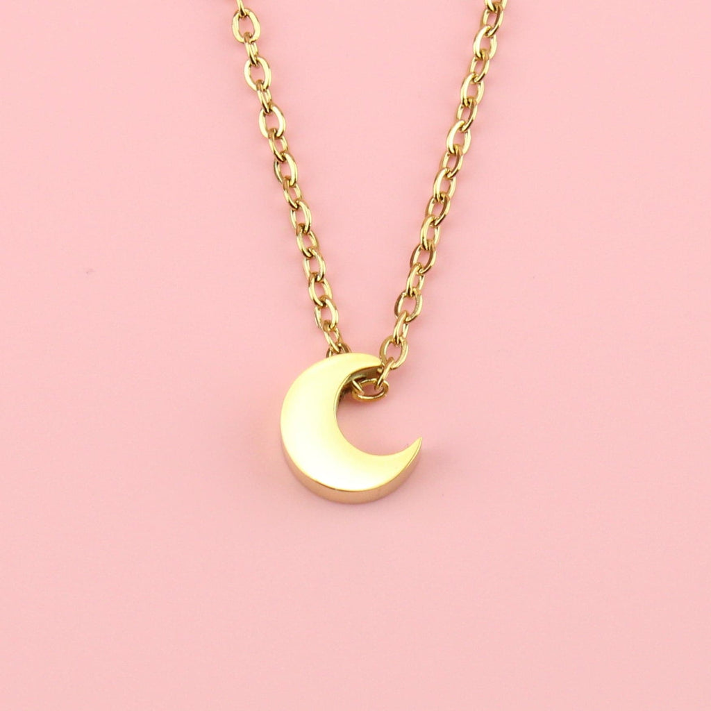 3D Crescent gold moon charm on a gold plated stainless steel chain