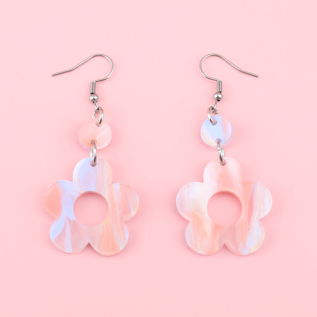 Pastel peach and blue perspex flower charms with cut out middle on stainless steel earwires