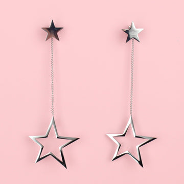Cut out stars suspended from a dangly chain and star studs