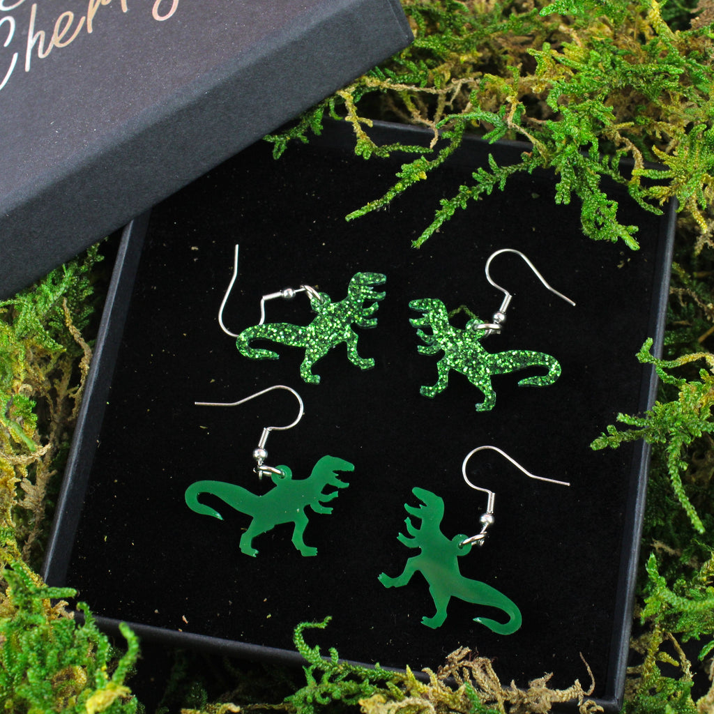 Classic Jurassic Glitter T-Rex Earringsshown in our Sour Cherry Gift Box