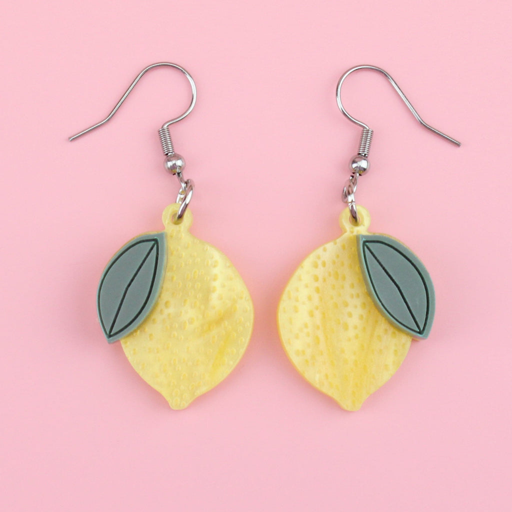 Yellow acrylic and matte green Perspex acrylic lemon charms on stainless steel earwires