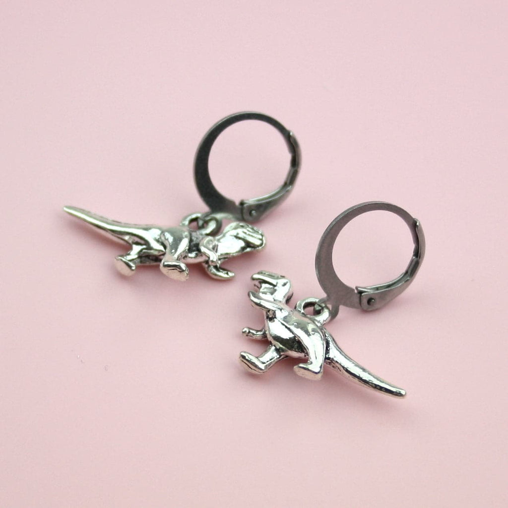 Stainless steel hoops with silver plated T-Rex charms