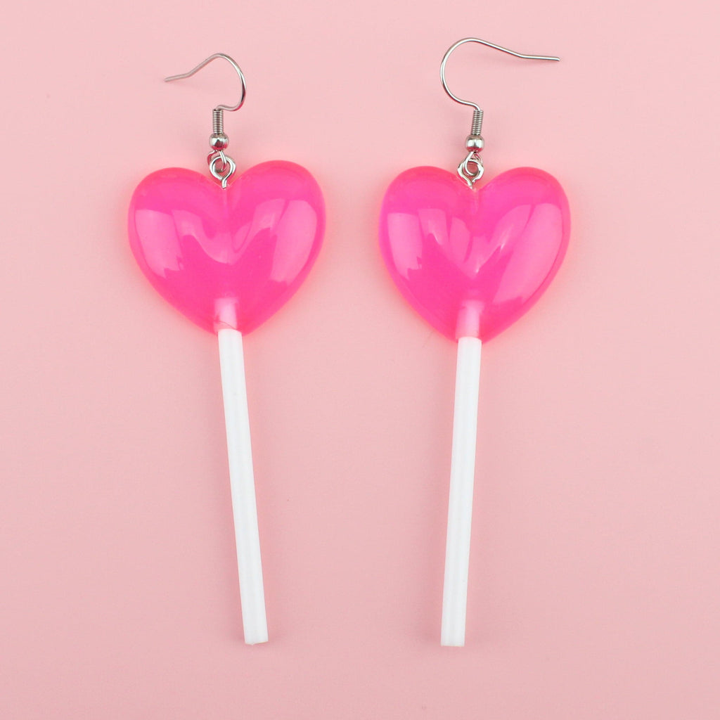 Large pink resin lollipop charms on stainless steel earwires