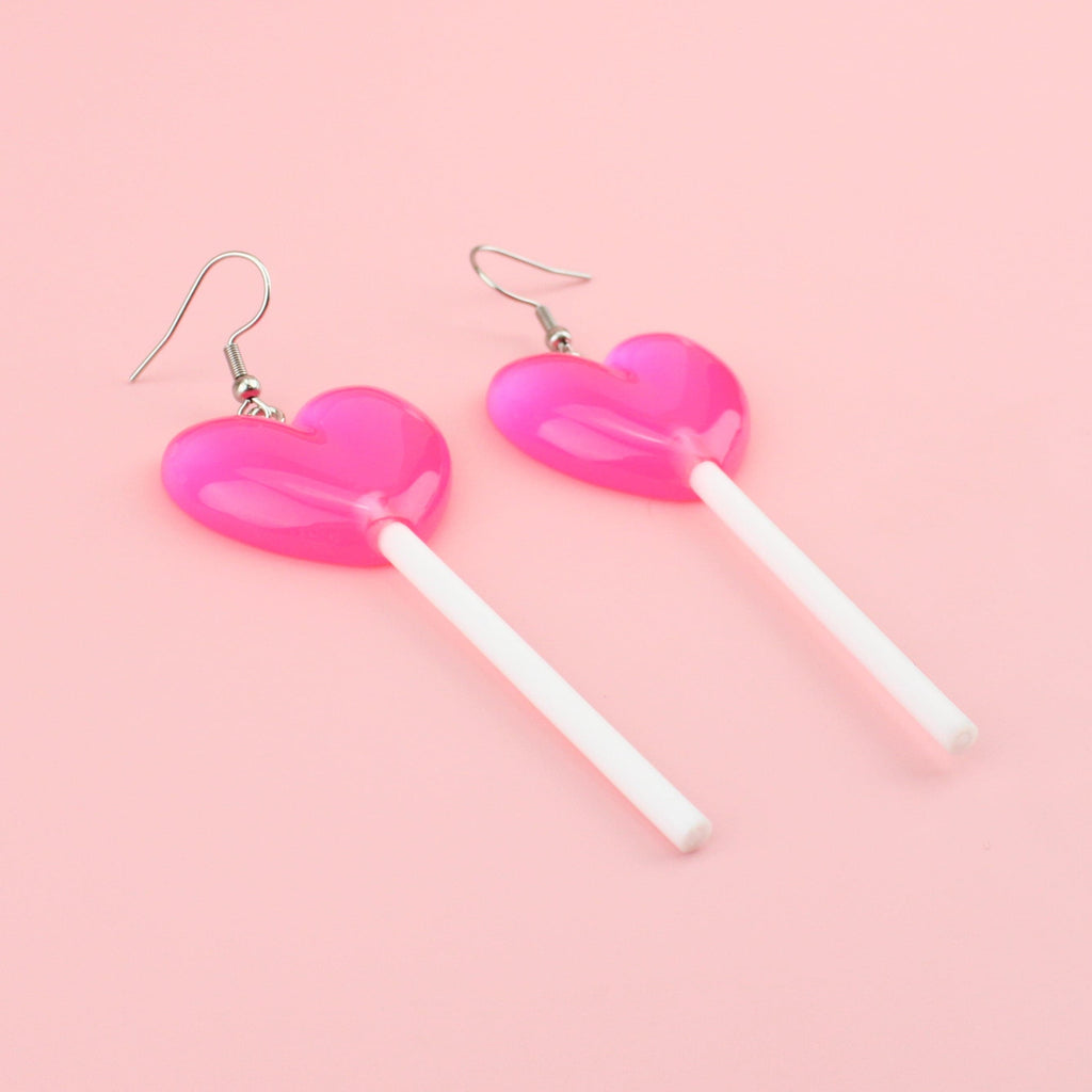 Large pink resin lollipop charms on stainless steel earwires