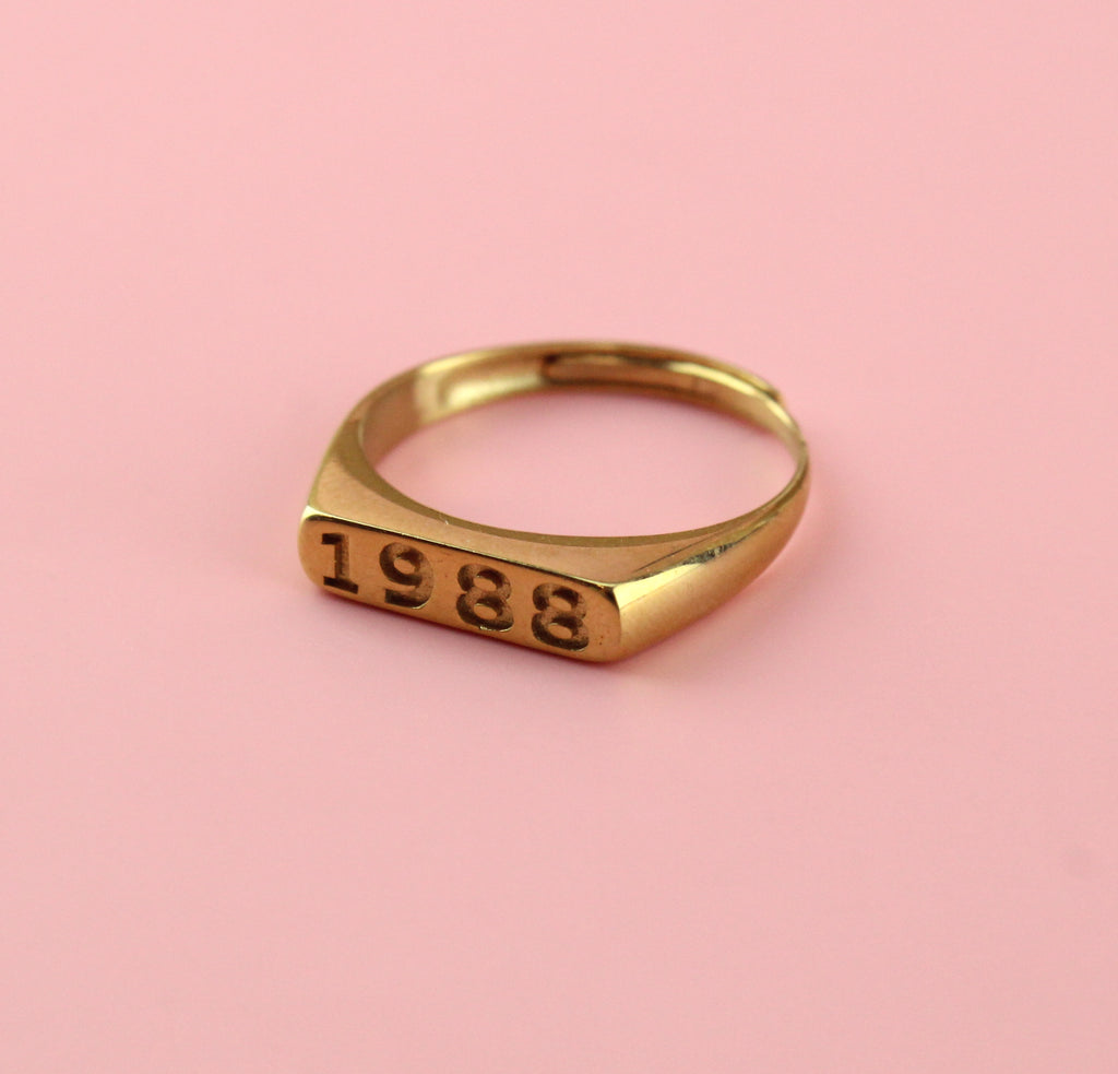 Gold plated stainless steel ring with 1988 engraved on the front
