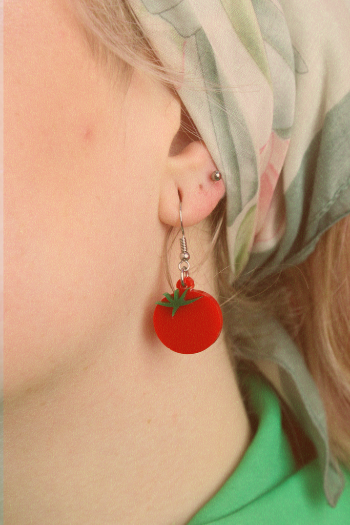 Model wearing Red acrylic tomato charms on stainless steel earwires 
