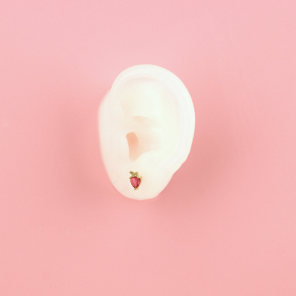 Ear wearing An Apple A Day Stud earrings