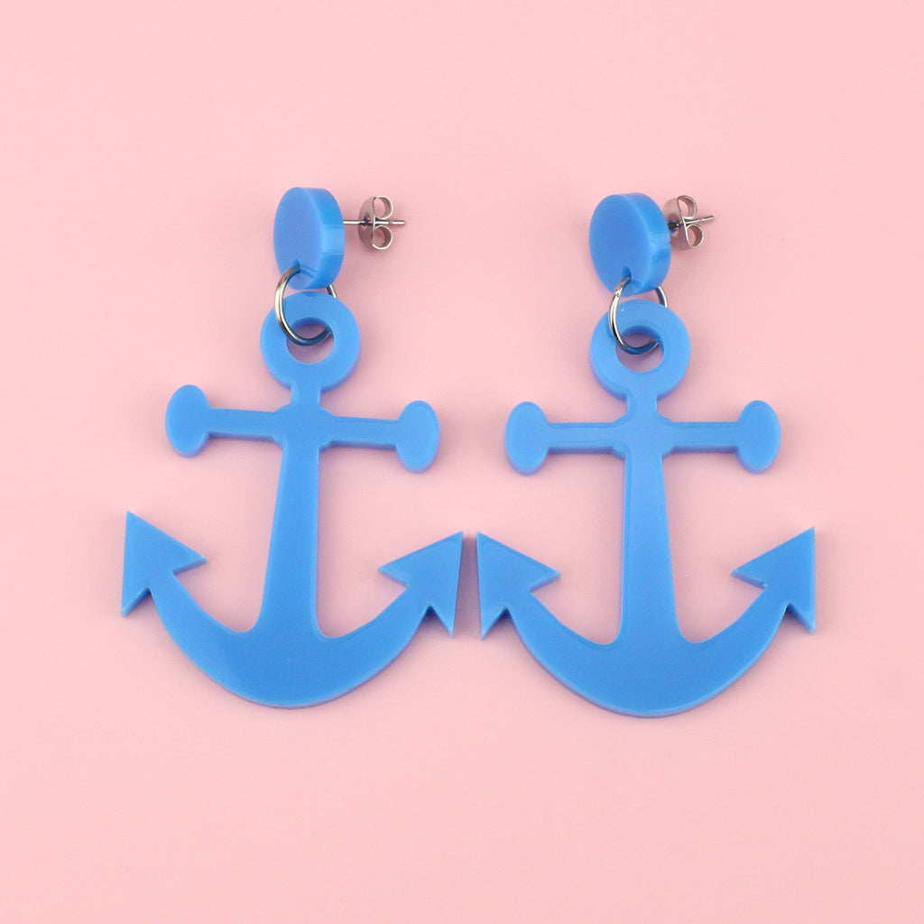 Anchor-shaped blue perspex charms on stainless steel studs