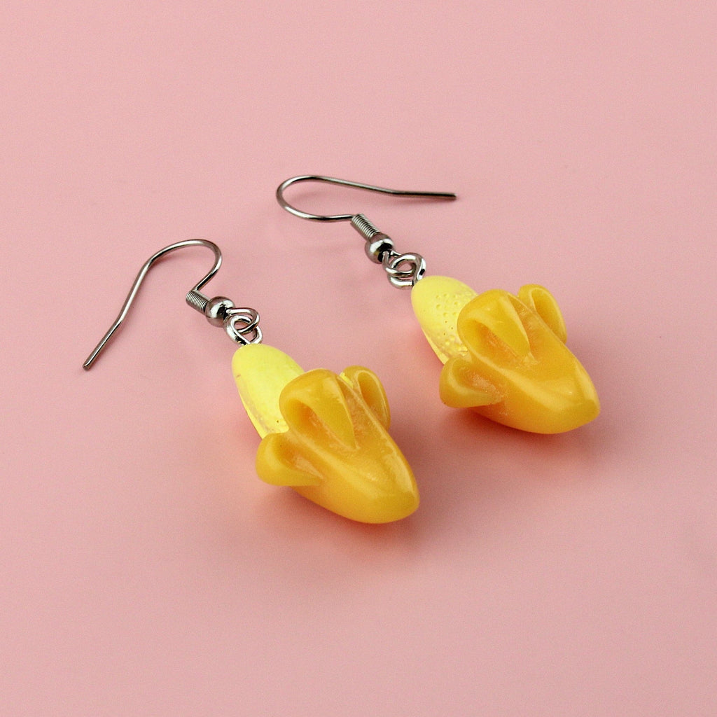 Half peeled resin banana charms on stainless steel earwires
