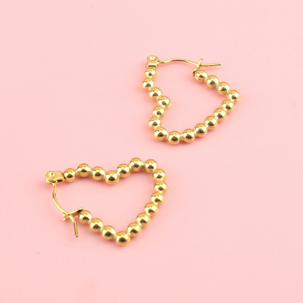 Heart shaped beaded hoop earrings with gold plating