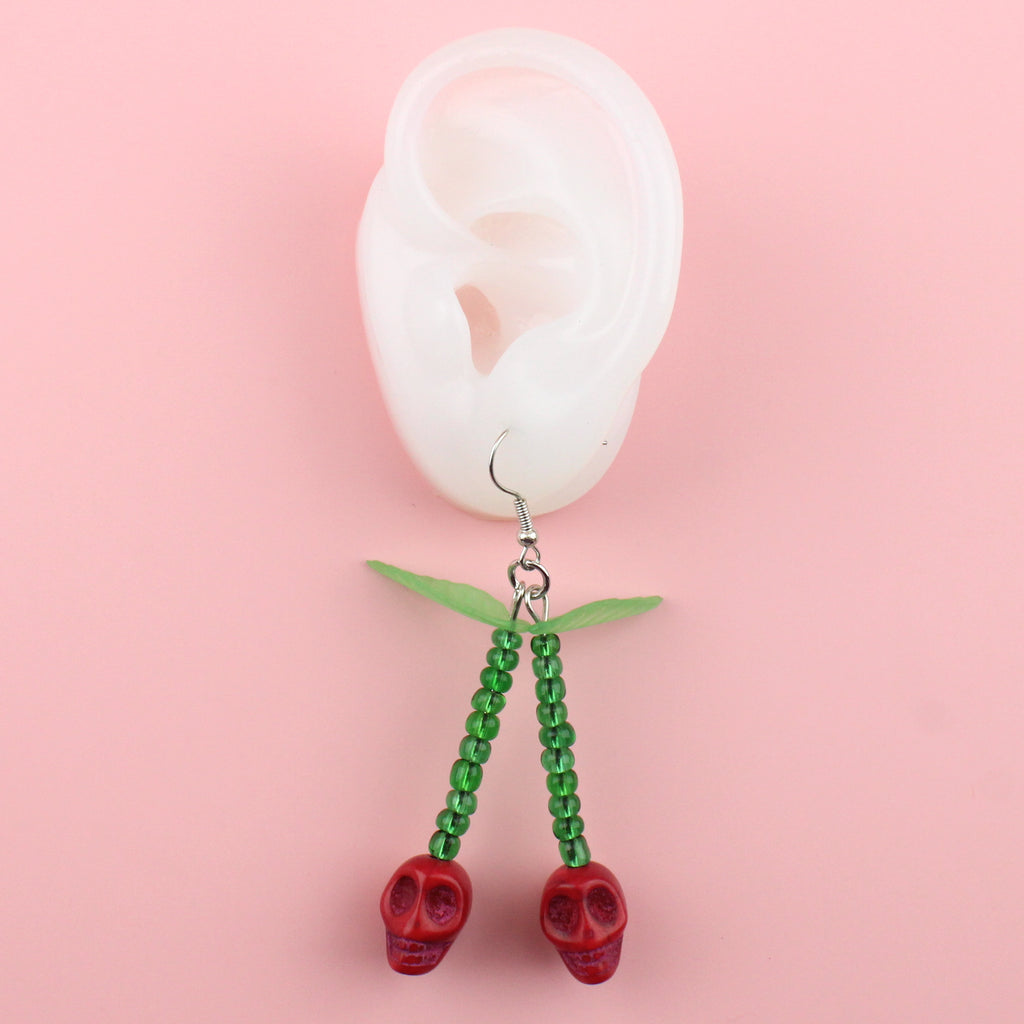 Ear wearing Bite of the Undead Earrings