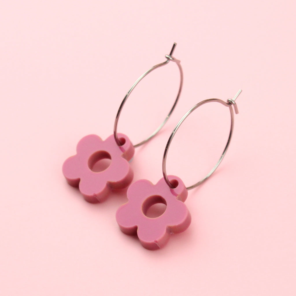 Rose pink flower acrylic charms with cut out middle on stainless steel hoops