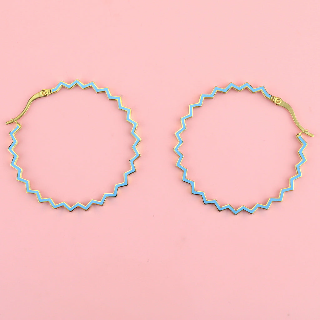 blue Zig zag shaped hoops with gold plating
