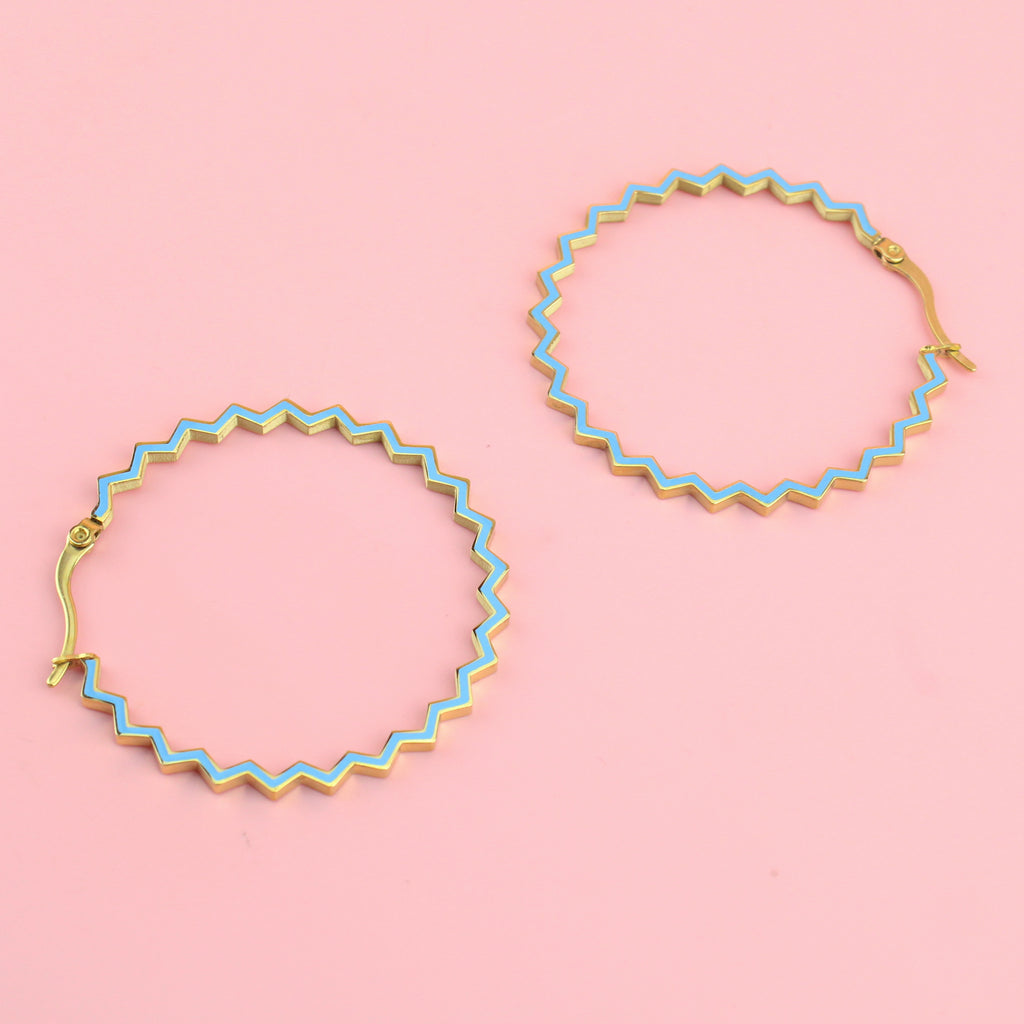 blue Zig zag shaped hoops with gold plating