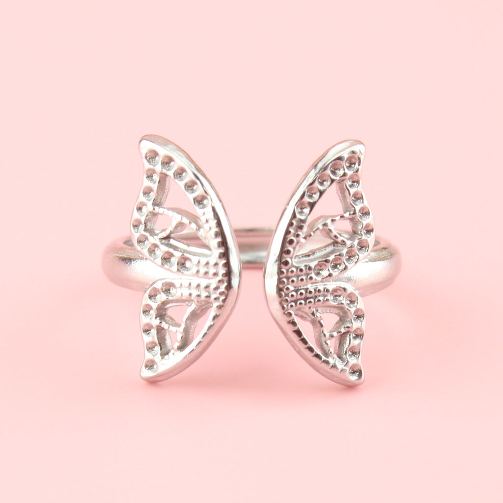 Stainless steel ring with butterfly wings at the front