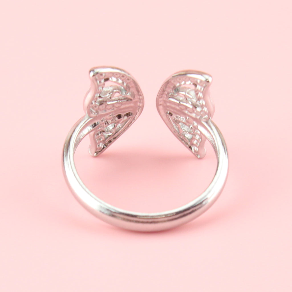 Stainless steel ring with butterfly wings at the front