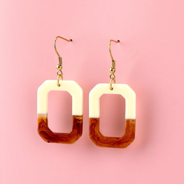 Half brown and half cream rectangle shaped earrings on gold plated stainless steel earwires