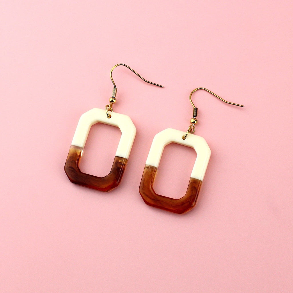 Half brown and half cream rectangle shaped earrings on gold plated stainless steel earwires