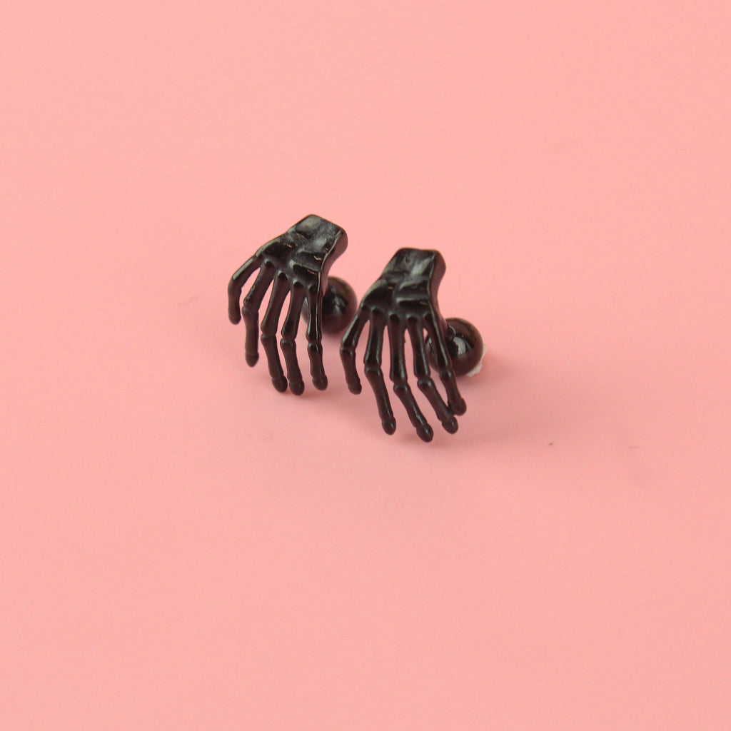 Black spooky hand stud with screw back