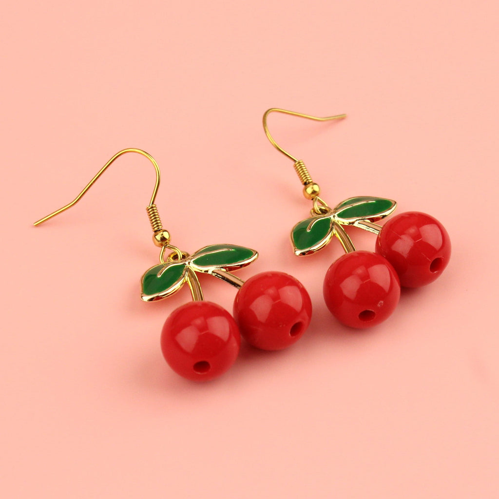 Red zinc alloy beads and gold plated stems and leaves on gold plated stainless steel earwires