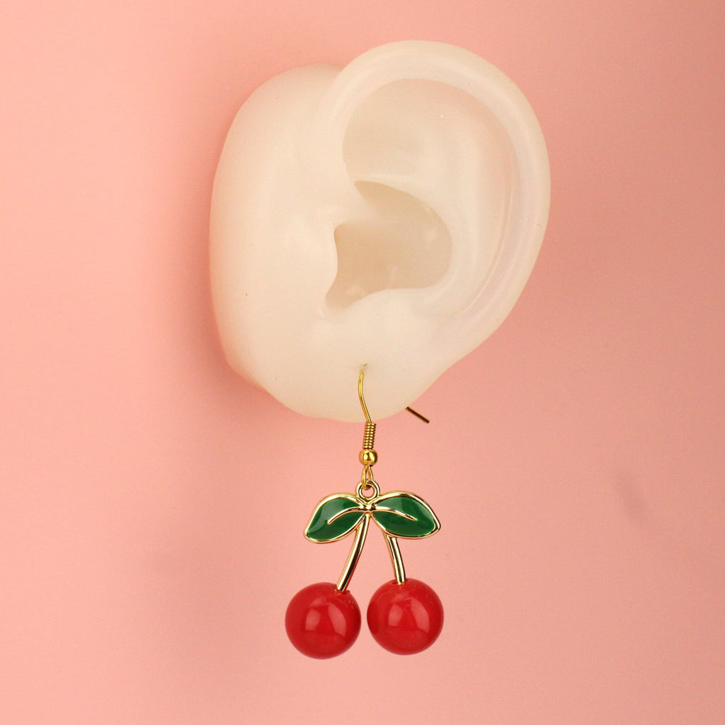 Ear wearing Cherry Bomb Earrings
