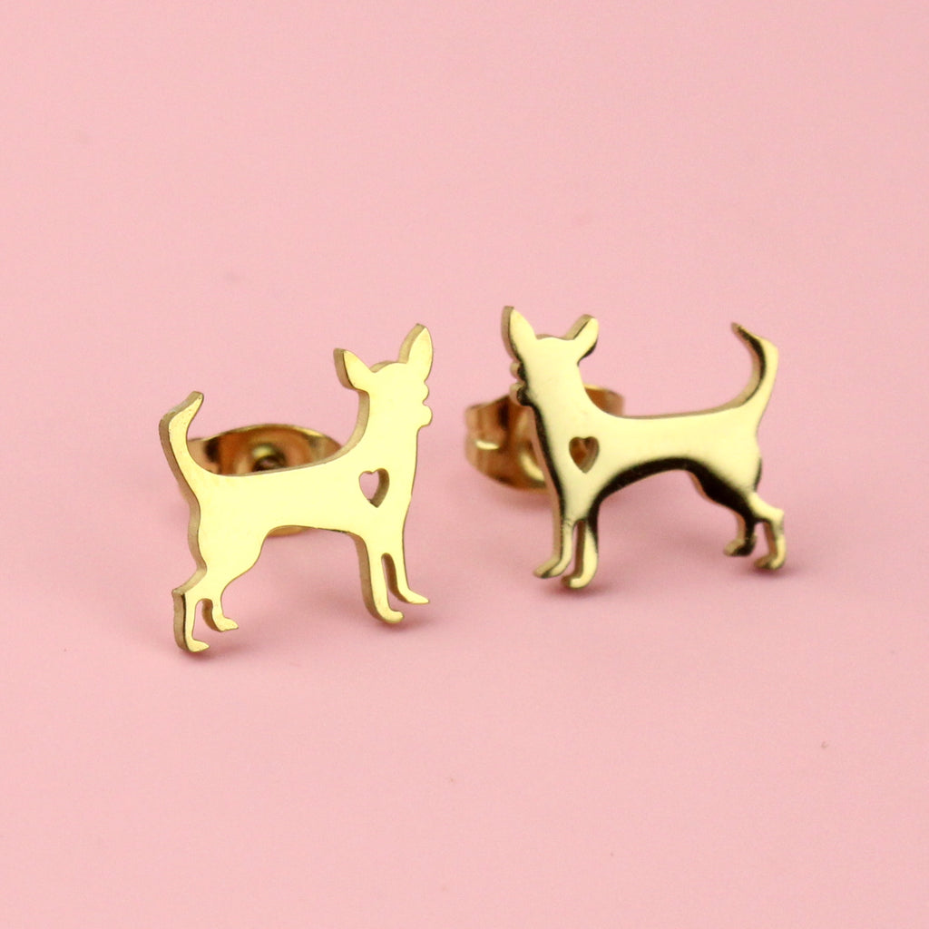 Gold plated stainless steel chihuahua shaped studs with a cut out heart