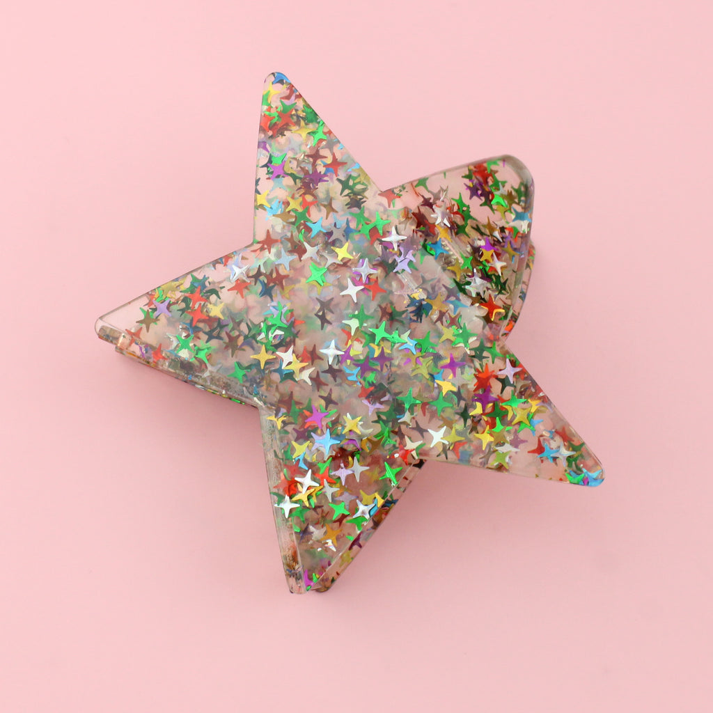 Confetti stars in a double sided star claw clip