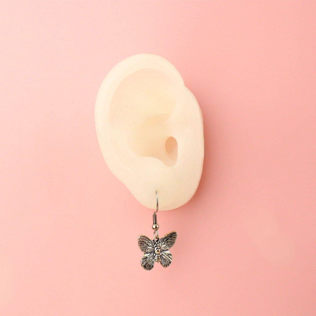 Ear wearing Butterfly charms