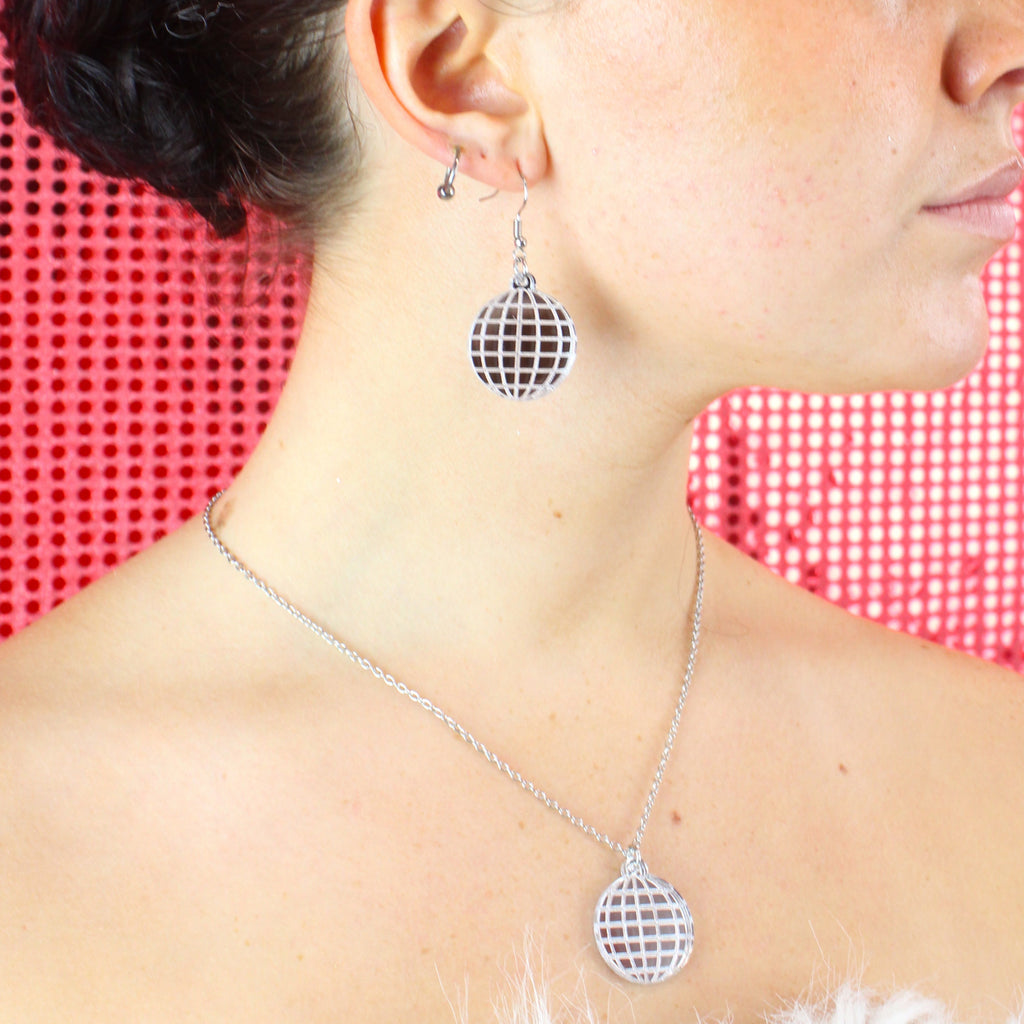 Model wearing Silver Mirror Acrylic Disco Ball Pendant Necklace on a stainless steel chain