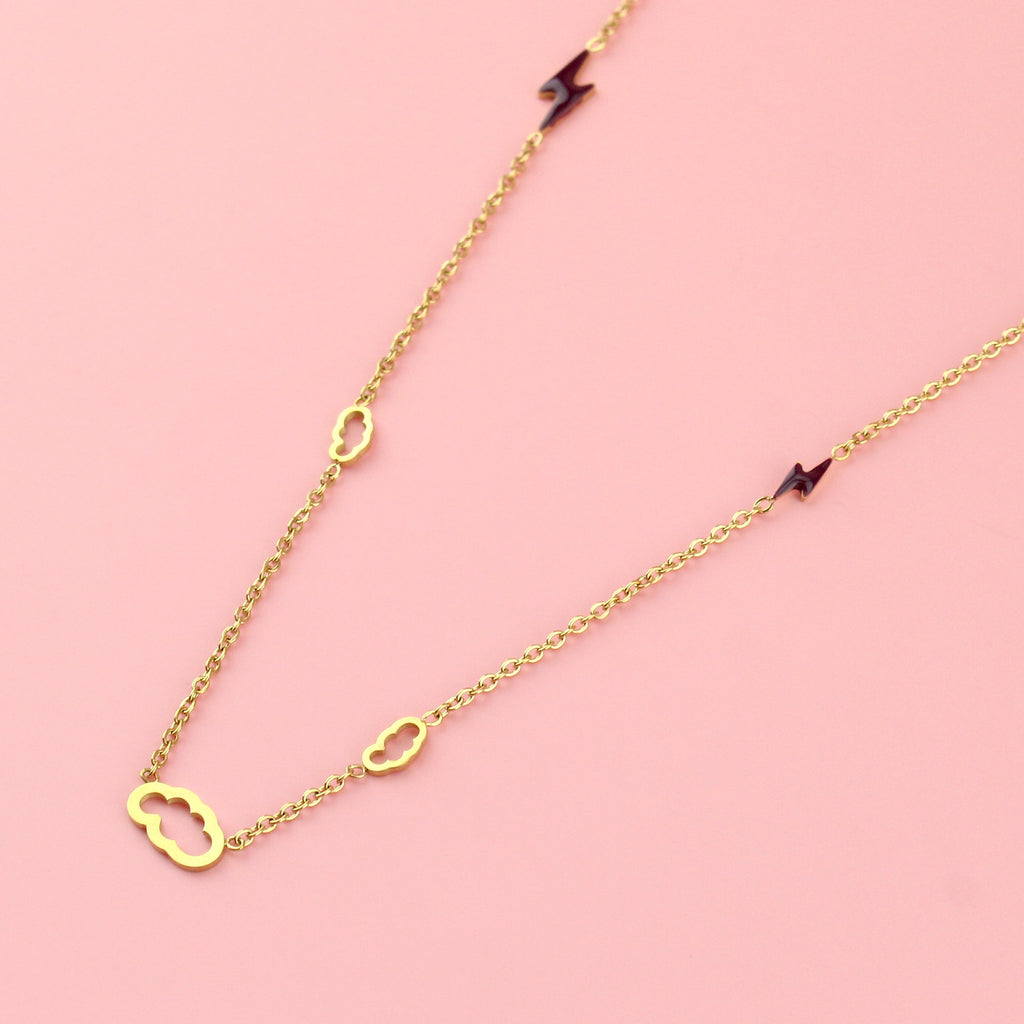 Gold plated stainless steel chain with cut out cloud and purple lighting bolt charms