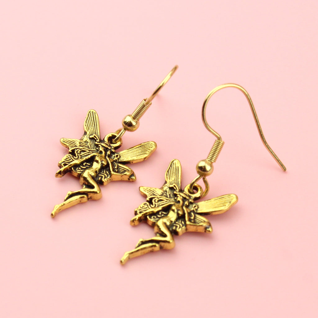 Naked gold fairy charms on gold plated stainless steel earwires