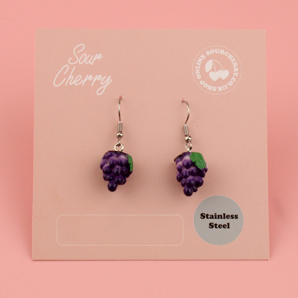 A bunch of grapes on stainless steel earwires shown on the card