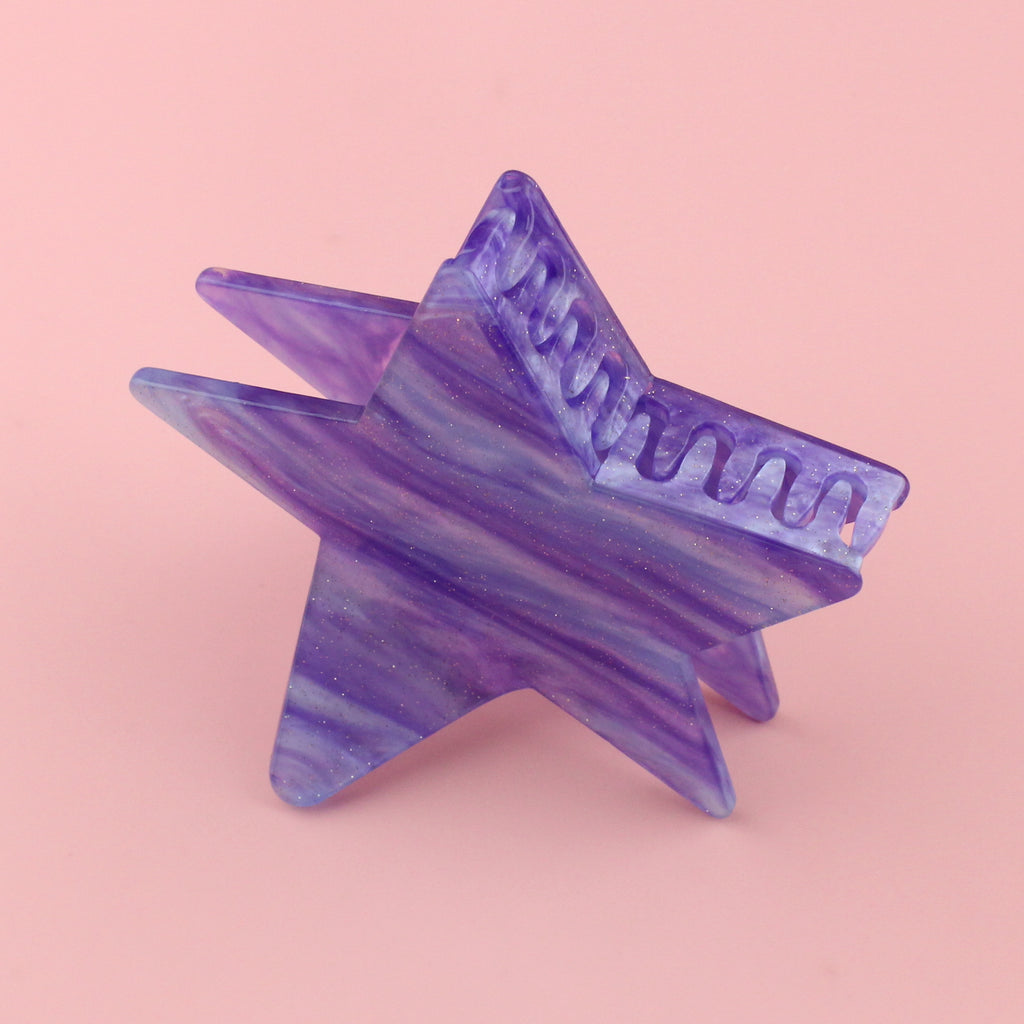 Purple galaxy marble design on a double sied star claw clip