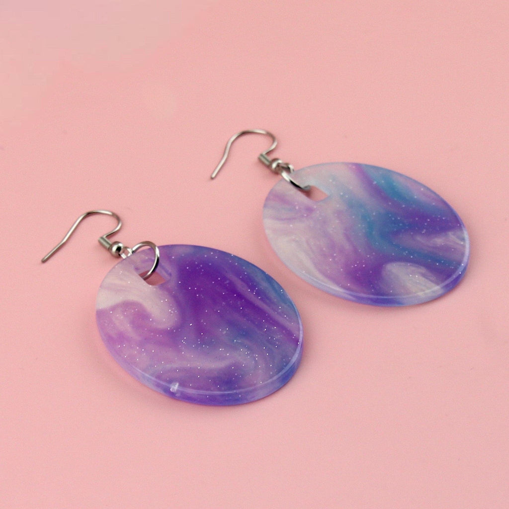 Oval shaped purple sparkling glittery marble resin charms on stainless steel earwires