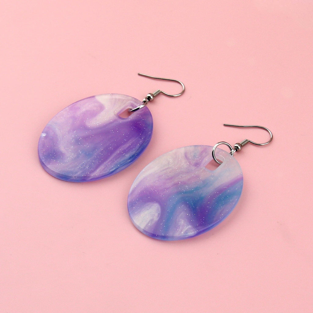 Oval shaped purple sparkling glittery marble resin charms on stainless steel earwires
