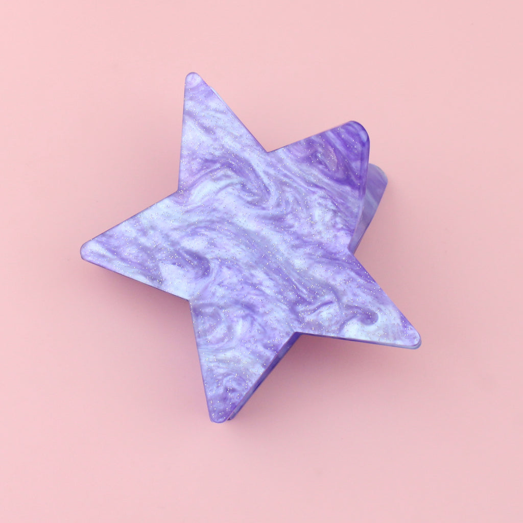 Purple galaxy marble design on a double sied star claw clip