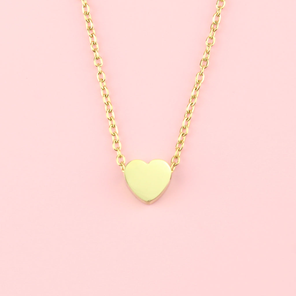 Solid gold heart pendant on a gold plated stainless steel chain
