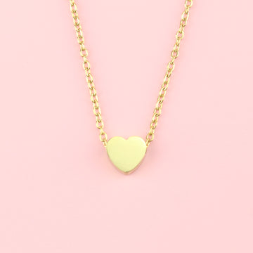 Solid gold heart pendant on a gold plated stainless steel chain