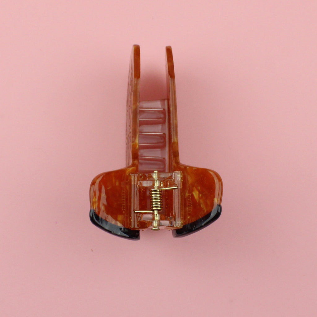 3D Claw Clip in the shape of a brown cowboy boot