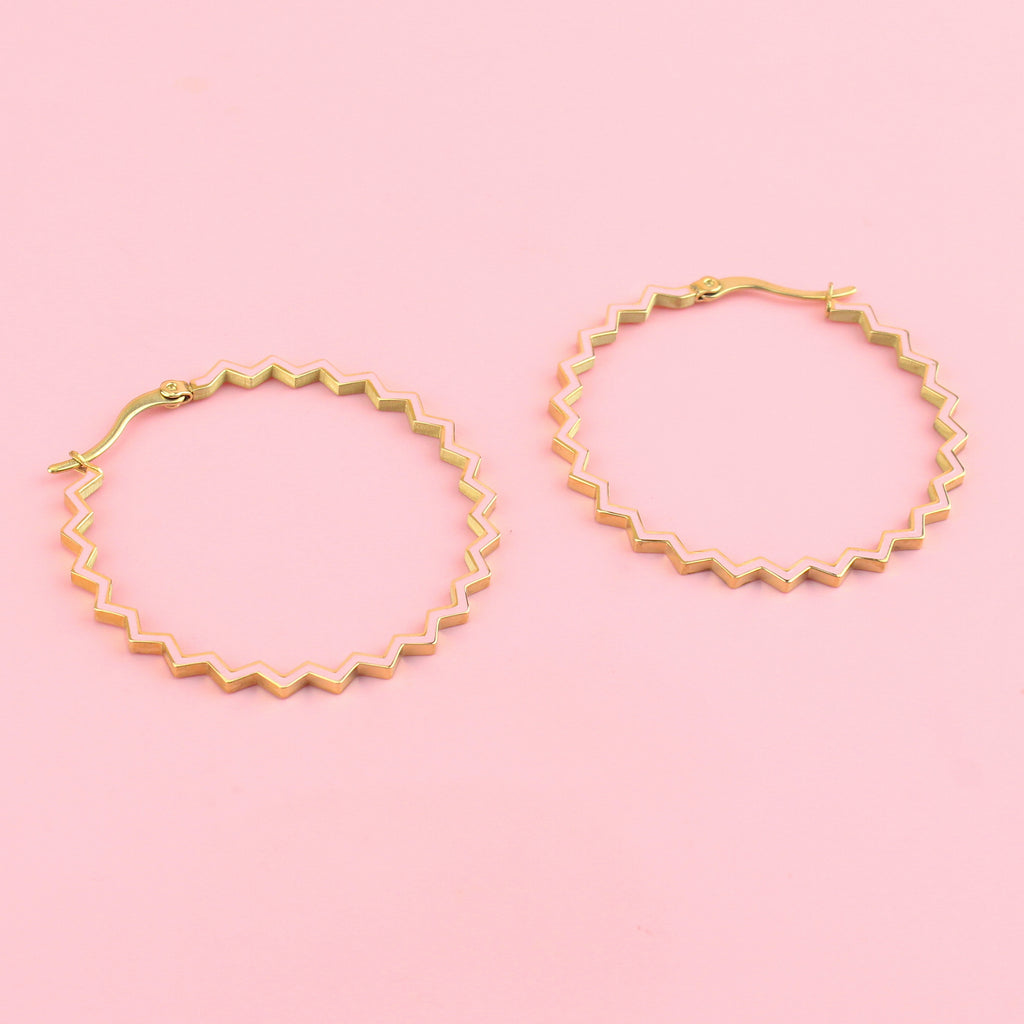 Pink zig zag hoop earrings with gold plating