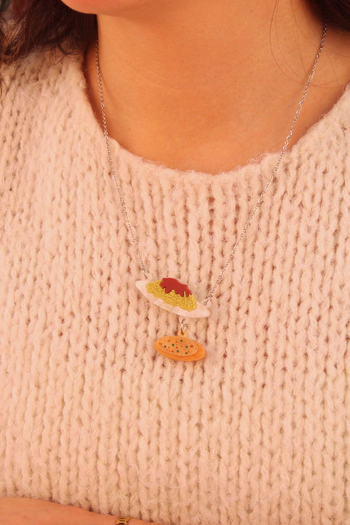 Model wearing Spaghetti bolognese and garlic bread pendants on a stainless steel chain